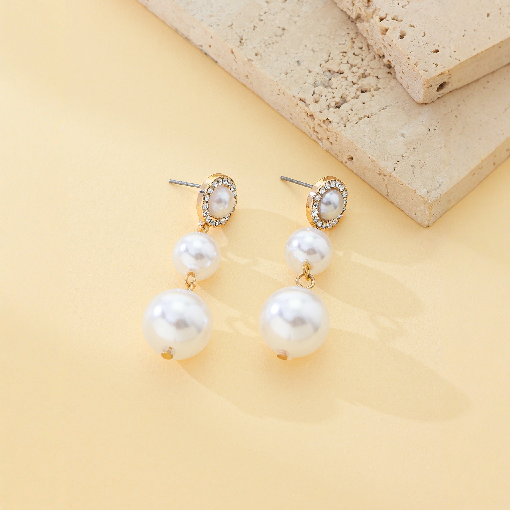 Hot cross-border sale in Japan and South Korea: Baroque pearl stud earrings, luxurious and high-end feel, adorned with diamonds. Unique design