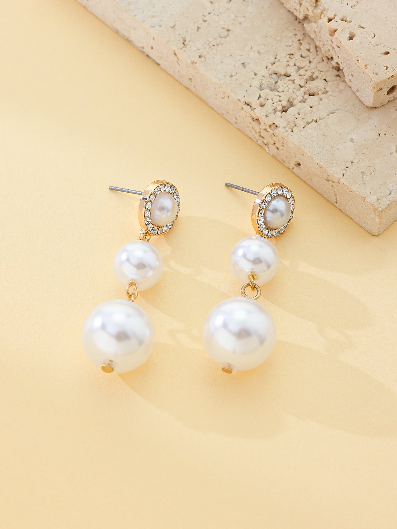 Hot cross-border sale in Japan and South Korea: Baroque pearl stud earrings, luxurious and high-end feel, adorned with diamonds. Unique design