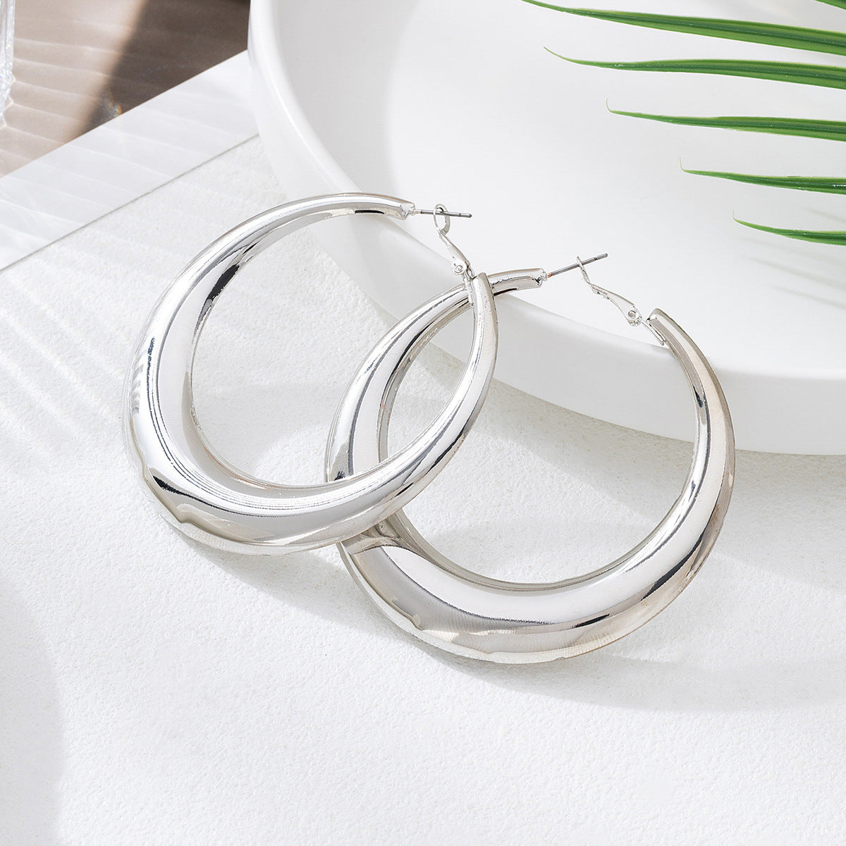 A pair of French vintage gold oval earrings – stylish women’s earrings, perfect for a vacation gift